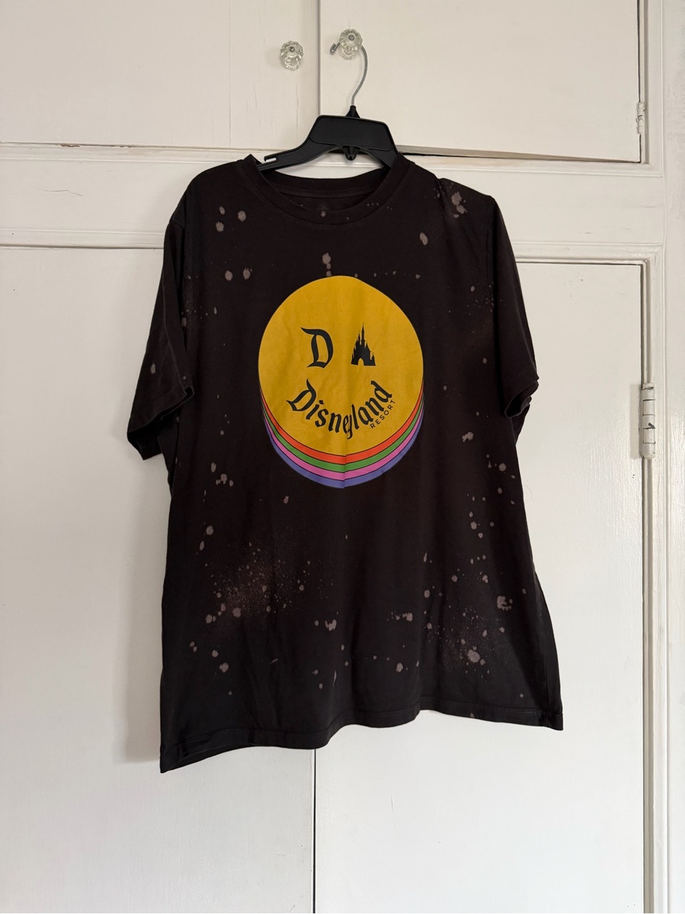 Disney Black Short Sleeve Tee with Yellow Logo and Rainbow Stripes